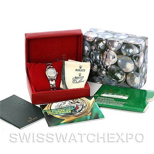 The image shows a Rolex Datejust 79163 Women's Steel and Gold (two tone) Silver Dial 79163 Women's Steel and Gold (two tone) Silver Dial watch with its box, cleaning cloth, manuals, tag, and warranty card from a frontal angle.
