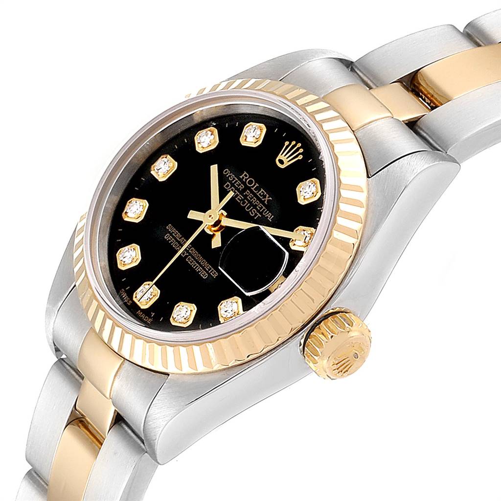 This image shows a close-up of the dial, bezel, crown, and bracelet of a Rolex Datejust 79173 Women's Steel and Gold (two tone) Black Dial 79173 Women's Steel and Gold (two tone) Black Dial watch.