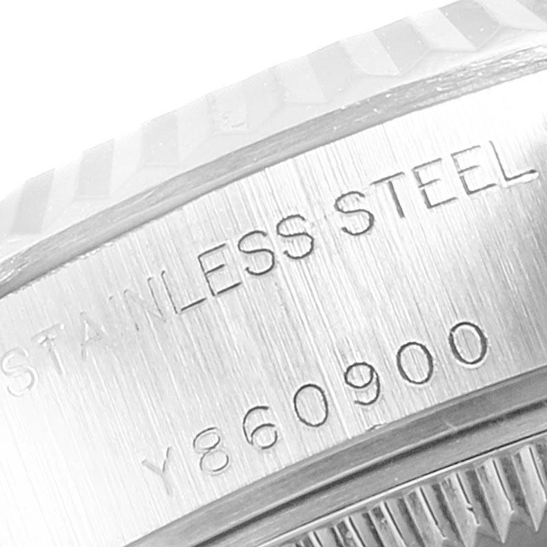 This image shows a close-up of the stainless steel case and serial number for a Rolex Datejust 79174 Women
s Stainless Steel Mother of Pearl Dial 79174 Women
s Stainless Steel Mother of Pearl Dial watch.
