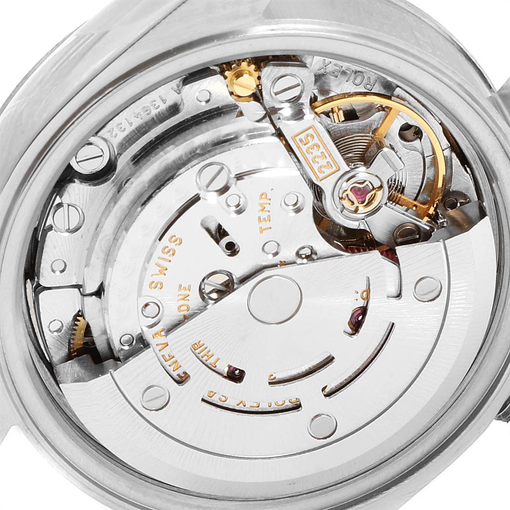 This image shows the detailed movement mechanism of a Rolex Datejust 79174 Women
s Stainless Steel Mother of Pearl Dial 79174 Women
s Stainless Steel Mother of Pearl Dial watch from an angle revealing its internal components.