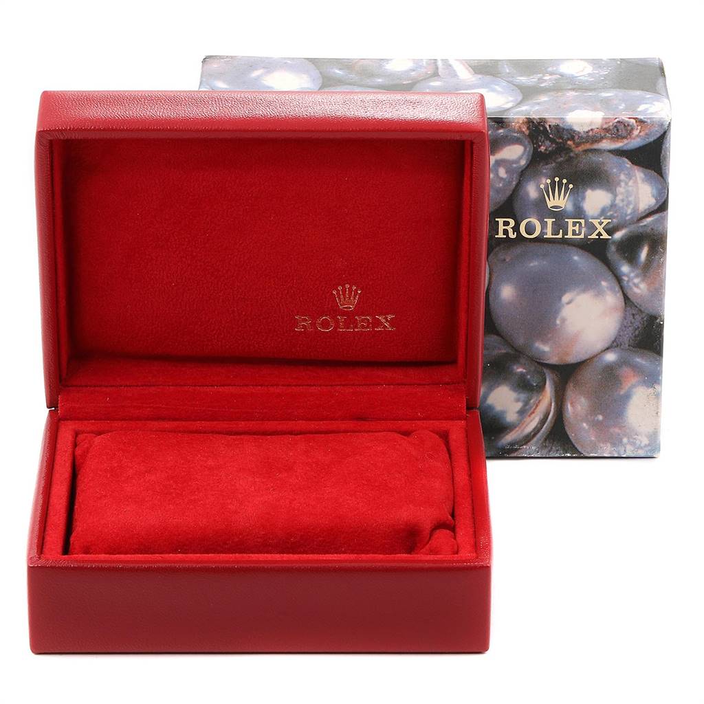The image shows an empty red Rolex watch box and outer packaging for a Datejust model.