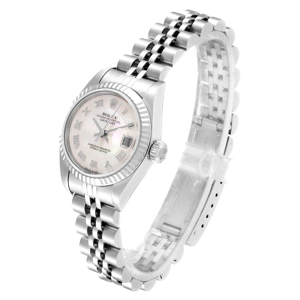 This Rolex Datejust 79174 Women
s Stainless Steel Mother of Pearl Dial 79174 Women
s Stainless Steel Mother of Pearl Dial watch is shown from an angled side view, highlighting its face, bezel, crown, and bracelet.