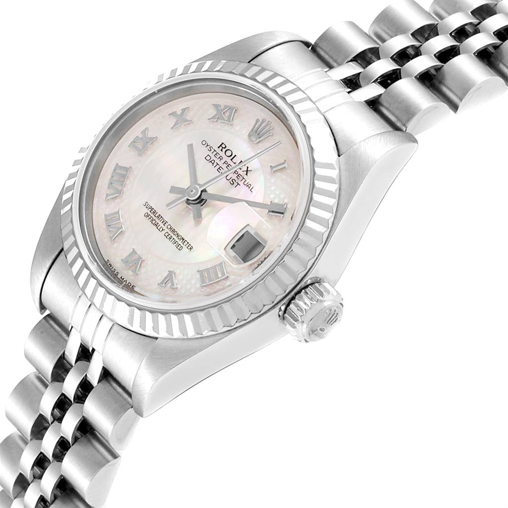 The Rolex Datejust 79174 Women
s Stainless Steel Mother of Pearl Dial 79174 Women
s Stainless Steel Mother of Pearl Dial watch is shown at a tilted angle, highlighting the dial, bezel, crown, and part of the bracelet.