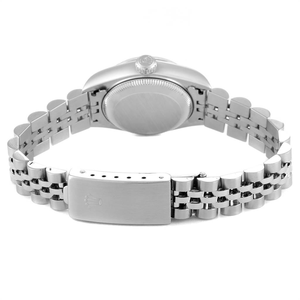 The image shows the back case, crown, and bracelet of a Rolex Datejust 79174 Women
s Stainless Steel Mother of Pearl Dial 79174 Women
s Stainless Steel Mother of Pearl Dial watch.