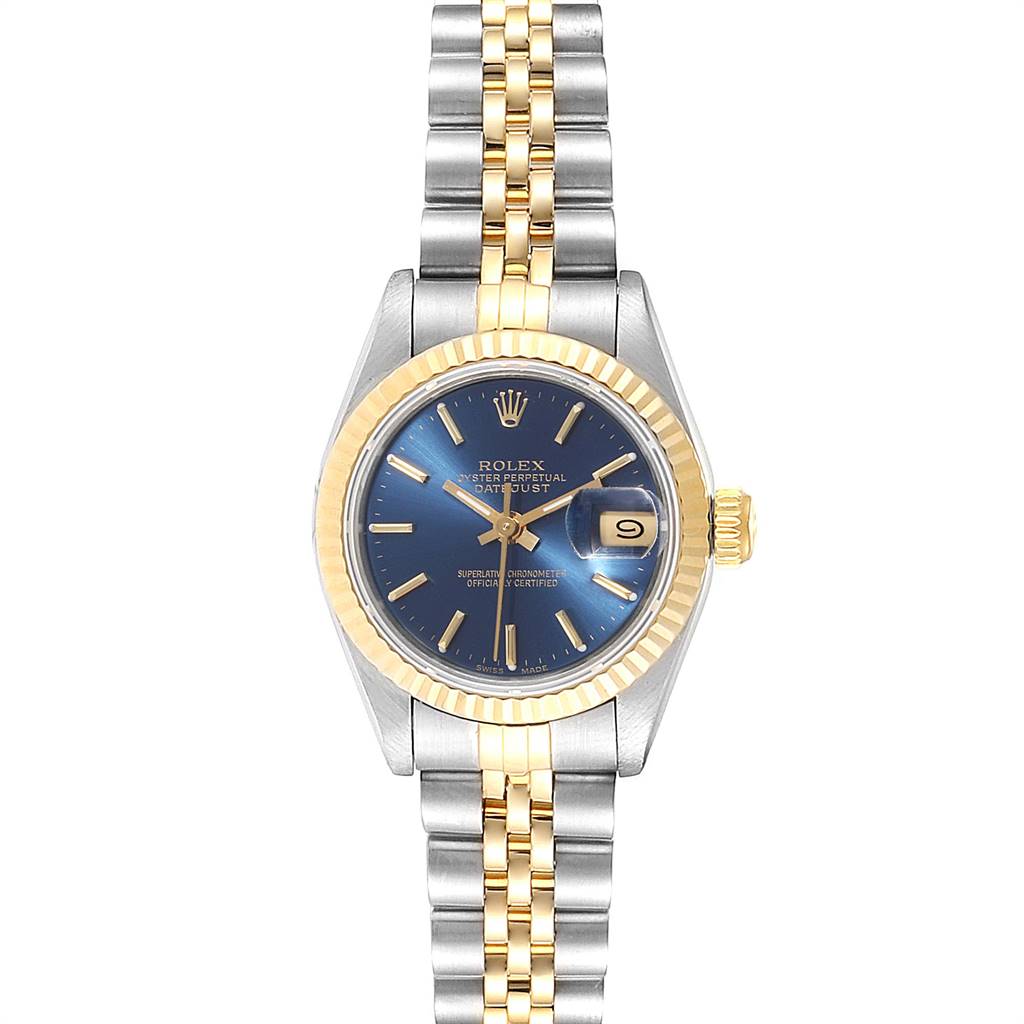 The image shows a front view of a Rolex Datejust 69173 Women's Stainless Steel Blue Dial 69173 Women's Stainless Steel Blue Dial watch, featuring a blue dial, gold fluted bezel, and a two-tone bracelet.