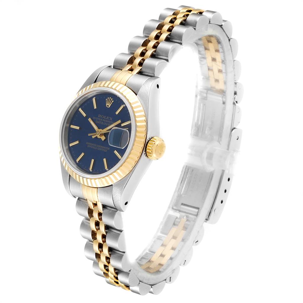 The Rolex Datejust 69173 Women's Stainless Steel Blue Dial 69173 Women's Stainless Steel Blue Dial watch is shown at a three-quarter angle, highlighting its gold and silver bracelet, face, and crown.