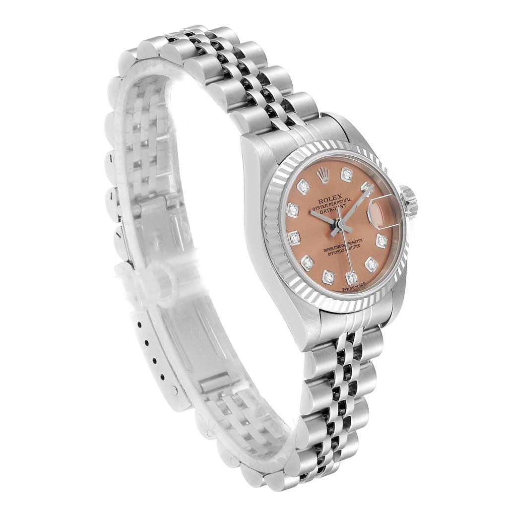 The Rolex Datejust 79174 Women
s Stainless Steel Pink Dial 79174 Women
s Stainless Steel Pink Dial watch is shown at a slight angle, highlighting its bracelet, dial, bezel, and crown.