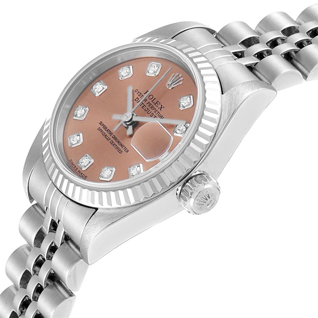 The image shows a Rolex Datejust 79174 Women
s Stainless Steel Pink Dial 79174 Women
s Stainless Steel Pink Dial watch at a side angle, highlighting the crown, bezel, dial, and part of the bracelet.