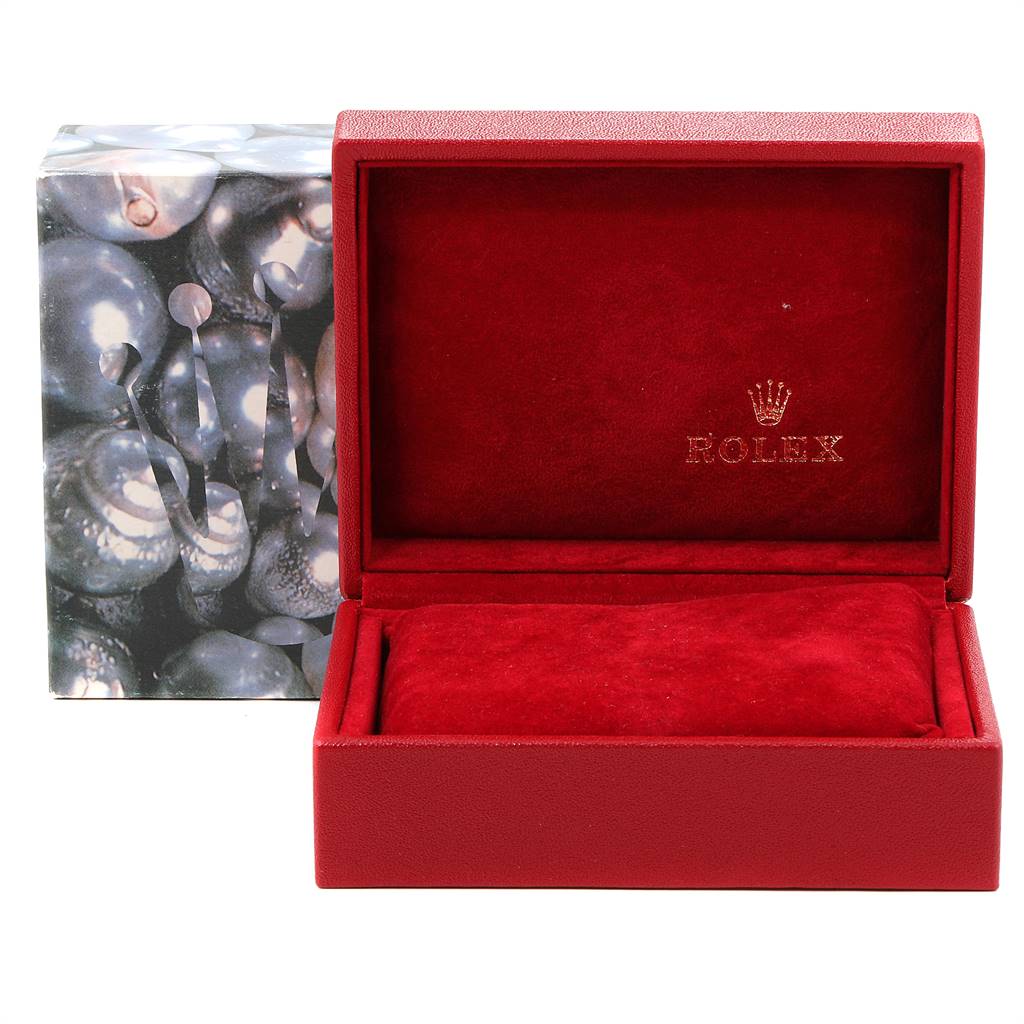 The image shows an open red Rolex box with plush interior for a Datejust model by Rolex and an outer sleeve.