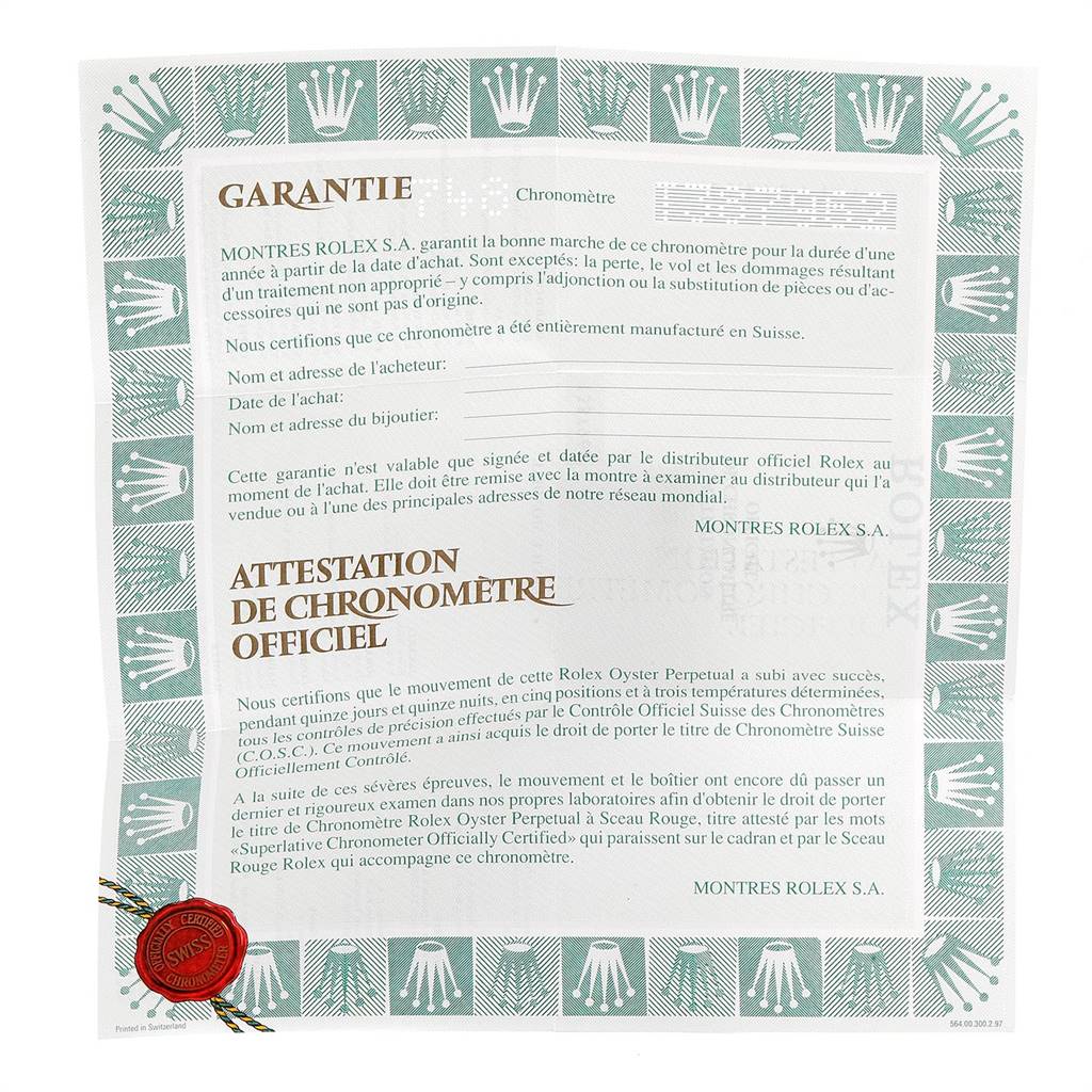 The image shows the warranty card for the Rolex Datejust 69173 Women's Stainless Steel White Dial 69173 Women's Stainless Steel White Dial watch, featuring text and a crown border design.