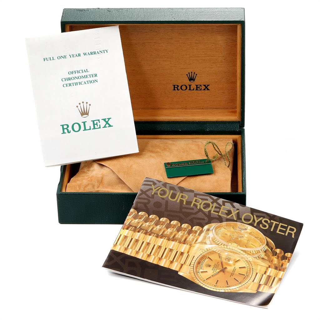 The image shows a Rolex Datejust 69173 Women's Stainless Steel Black Dial 69173 Women's Stainless Steel Black Dial box with warranty card, booklet, and tags.