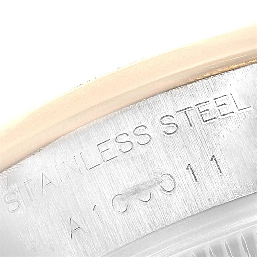 The image shows a close-up of the stainless steel case back with engraved details of a Rolex Datejust 79163 Women's Steel and Gold (two tone) Grey Dial 79163 Women's Steel and Gold (two tone) Grey Dial watch.