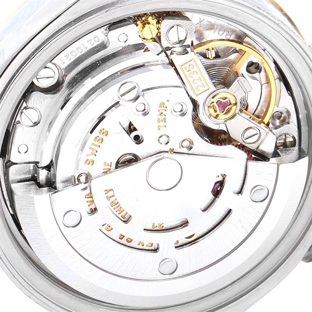 This is a close-up view of the internal mechanism of a Rolex Datejust 79163 Women's Steel and Gold (two tone) Grey Dial 79163 Women's Steel and Gold (two tone) Grey Dial watch, focusing on the movement parts.