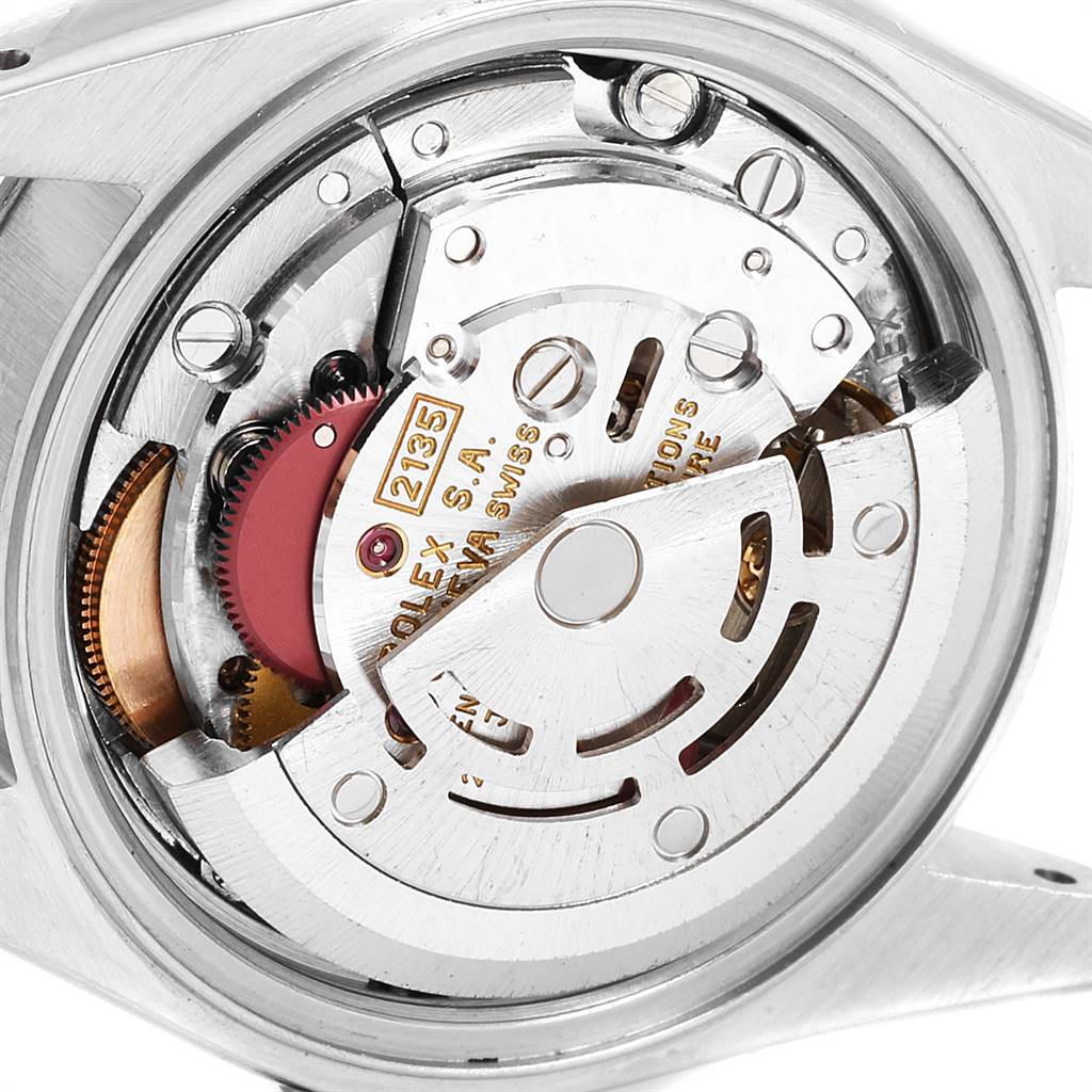 The image shows the internal movement mechanism of a Rolex Datejust 69174 Women
s Stainless Steel Silver Dial 69174 Women
s Stainless Steel Silver Dial watch from a back angle.