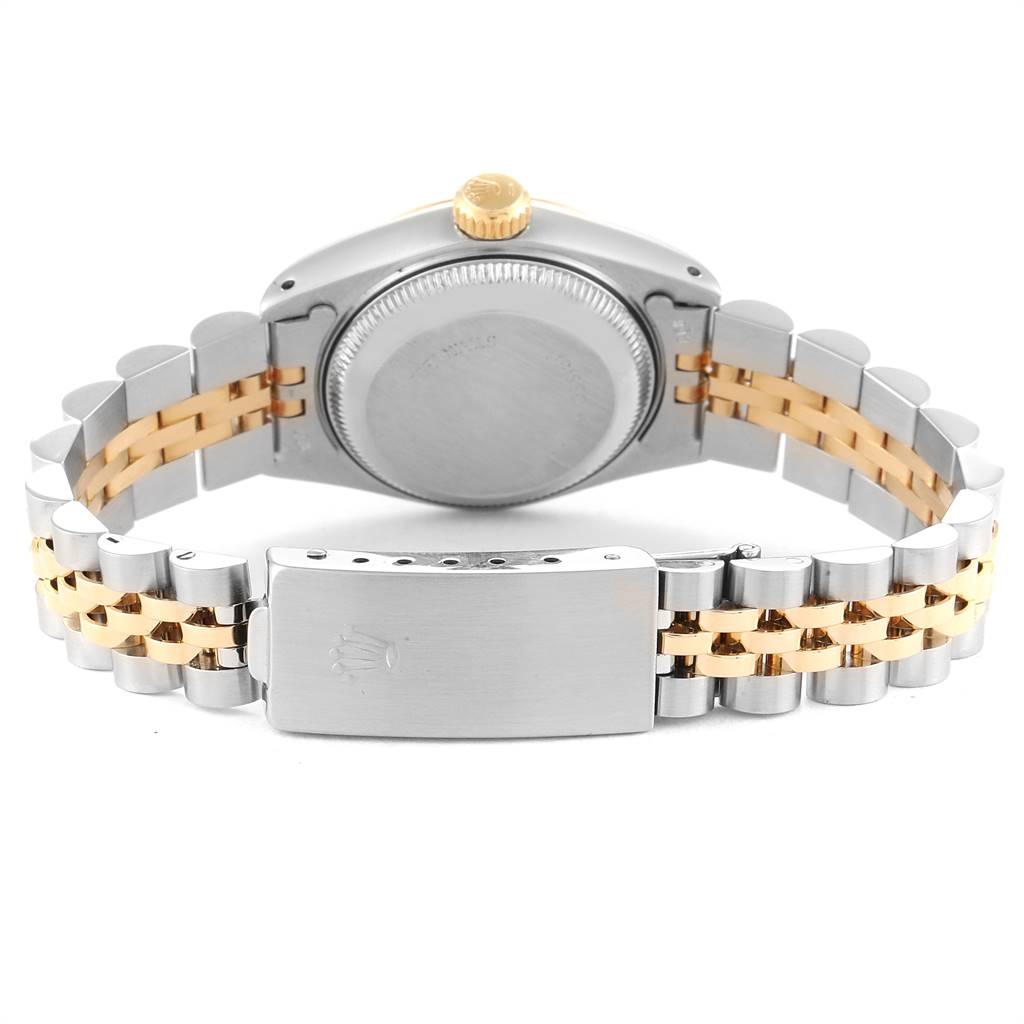 The image shows the back view of a Rolex Datejust 69173 Women's Stainless Steel Champagne Dial 69173 Women's Stainless Steel Champagne Dial, featuring the case back, crown, and Jubilee bracelet with a two-tone metal design.