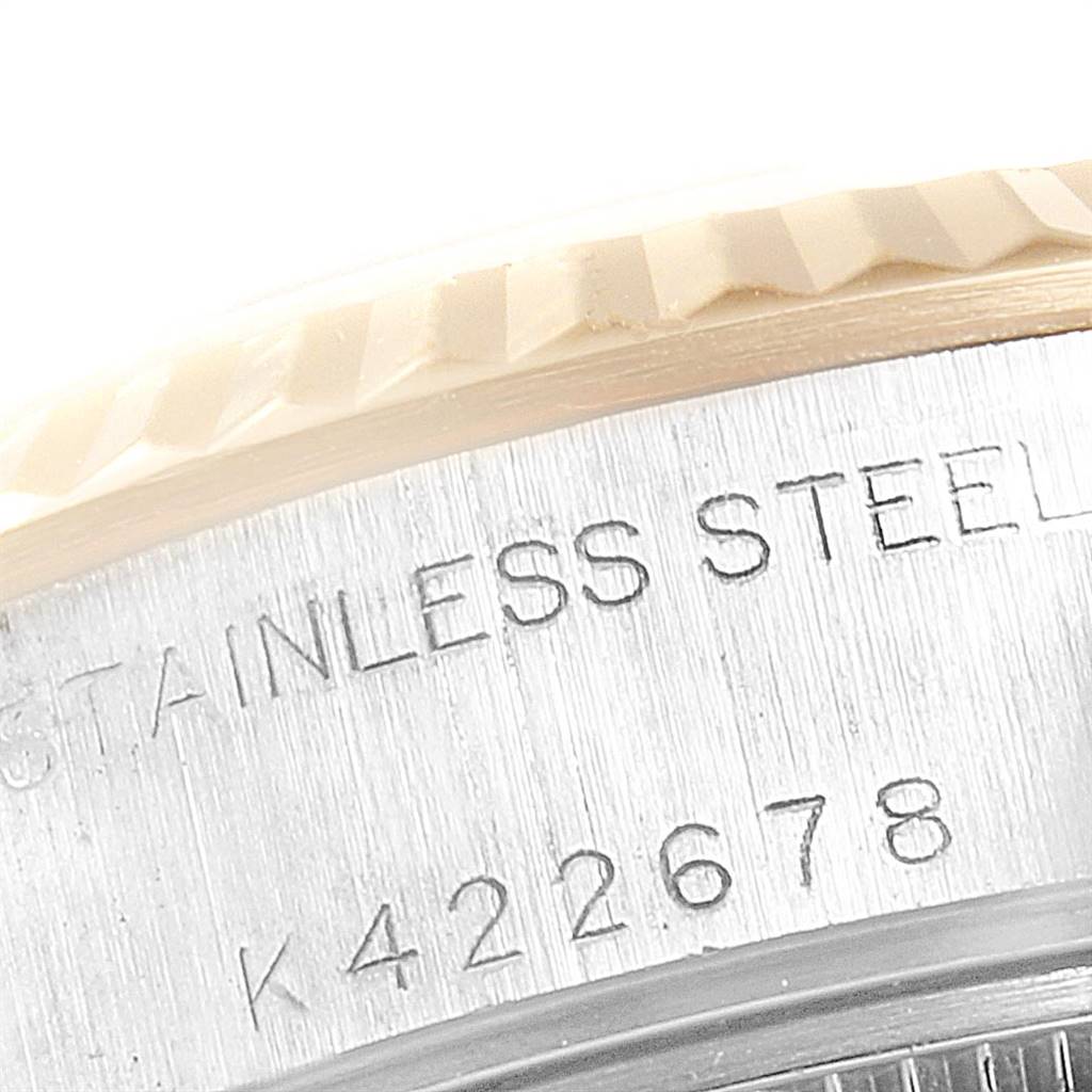 This image shows a close-up of the stainless steel case and fluted bezel of a Rolex Datejust 79173 Women's Stainless Steel Silver Dial 79173 Women's Stainless Steel Silver Dial watch.