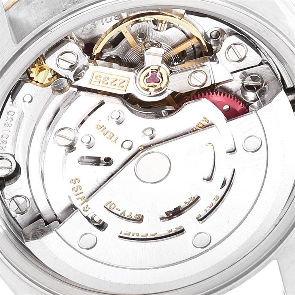 The image shows the internal mechanical movement of the Rolex Datejust 79173 Women's Stainless Steel Silver Dial 79173 Women's Stainless Steel Silver Dial watch, focusing on gears and components.