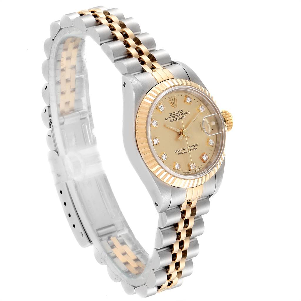 This image shows a Rolex Datejust 69173 Women's Stainless Steel Champagne Dial 69173 Women's Stainless Steel Champagne Dial watch angled to display its dial, fluted bezel, and two-tone Jubilee bracelet.