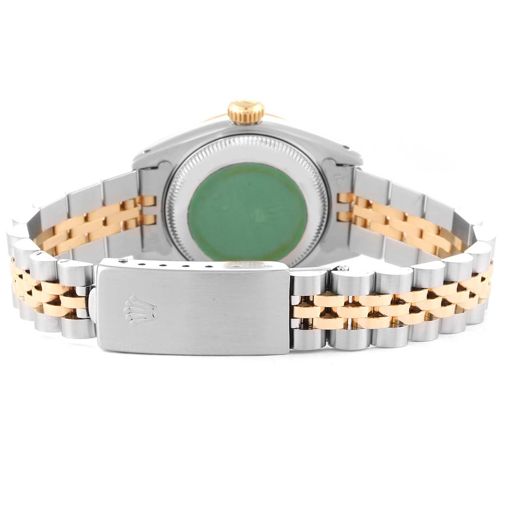 This is a rear view of the Rolex Datejust 69173 Women's Stainless Steel Champagne Dial 69173 Women's Stainless Steel Champagne Dial, highlighting the case back, gold crown, and two-tone Jubilee bracelet with the clasp visible.