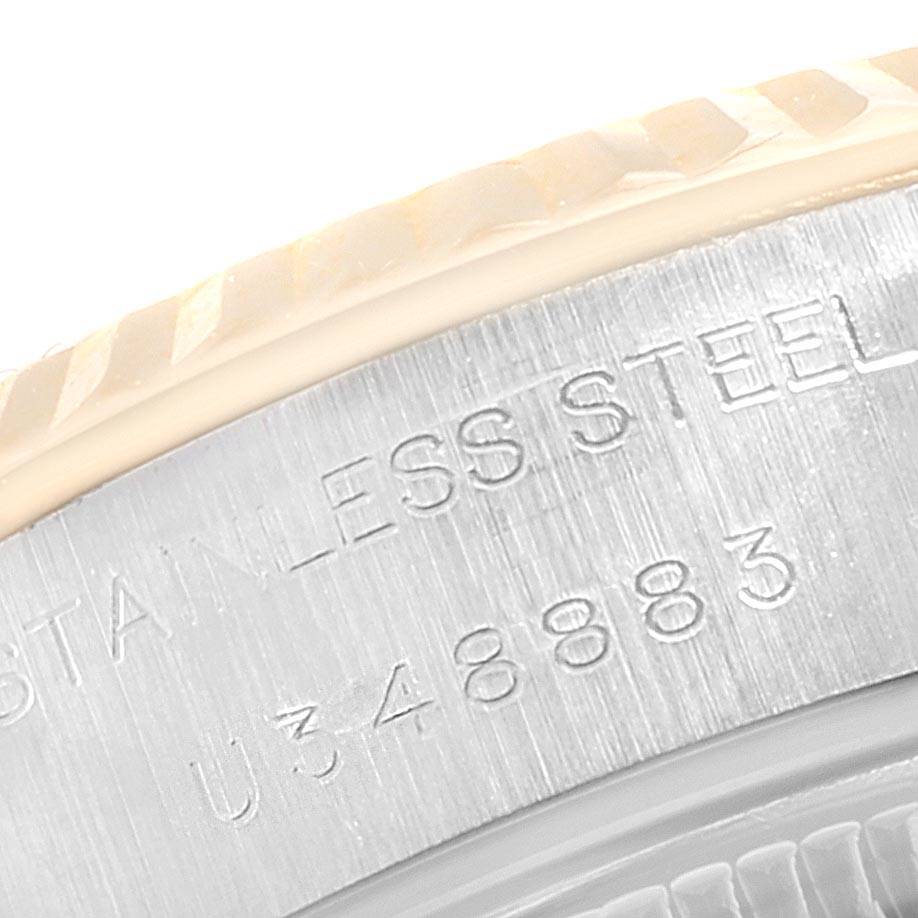 This image shows a close-up of the engraved stainless steel case back edge of a Rolex Datejust 69173 Women's Steel and Gold (two tone) Silver Dial 69173 Women's Steel and Gold (two tone) Silver Dial watch.