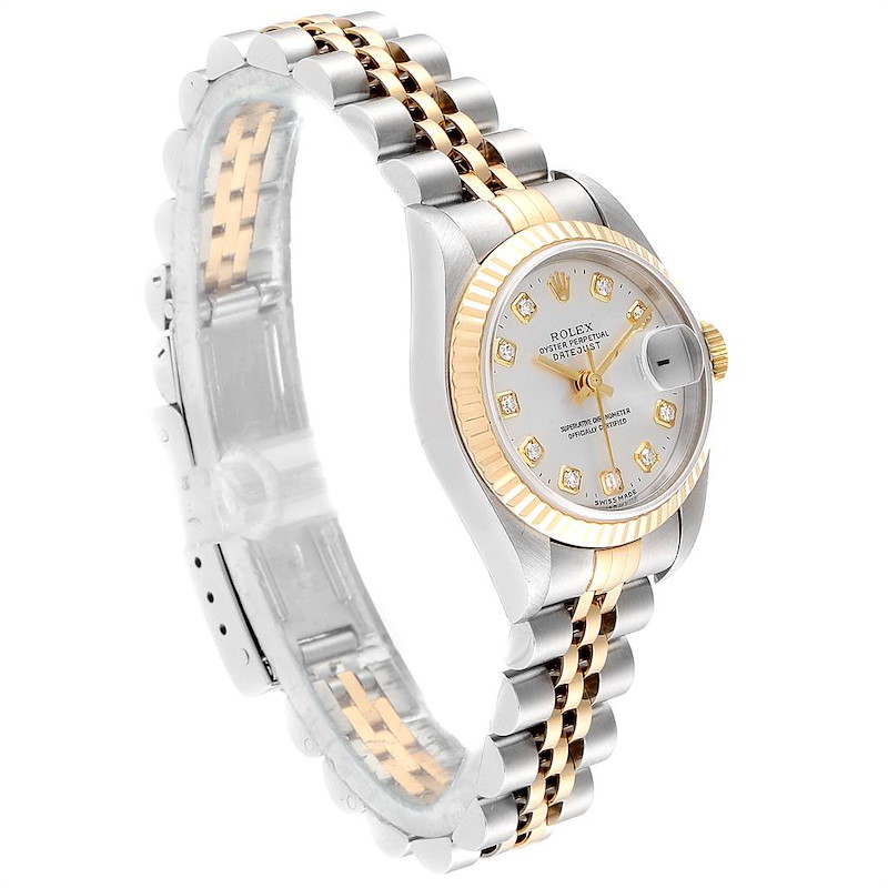 The image shows a side angle of a Rolex Datejust watch, highlighting its two-tone bracelet, dial, and fluted bezel.