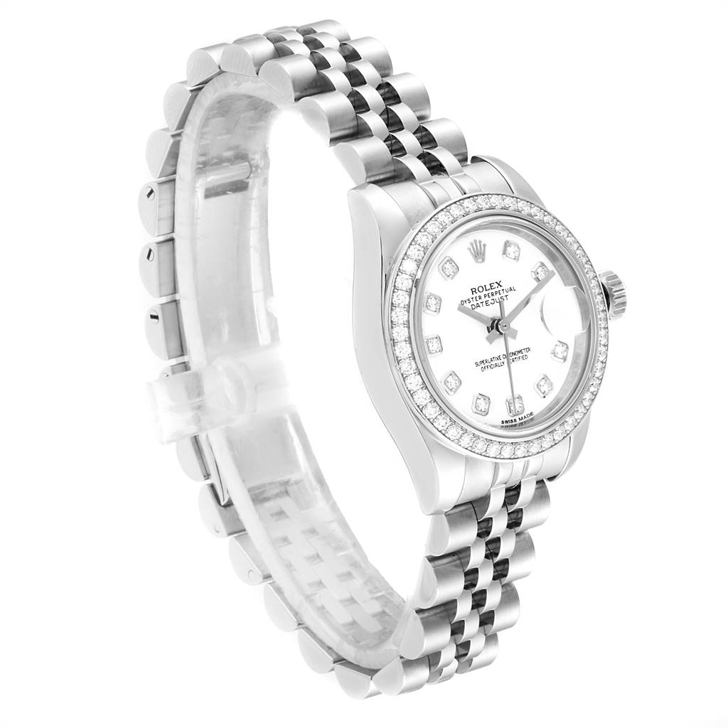 The Rolex Datejust 179384 Women's Stainless Steel White Dial 179384 Women's Stainless Steel White Dial watch is shown at a slight angle, displaying the face, bezel, and bracelet in a side view.