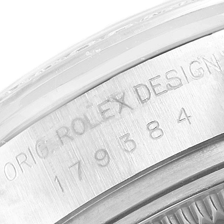 The image shows a close-up of the side engraving on the case of a Rolex Datejust 179384 Women's Stainless Steel White Dial 179384 Women's Stainless Steel White Dial watch.