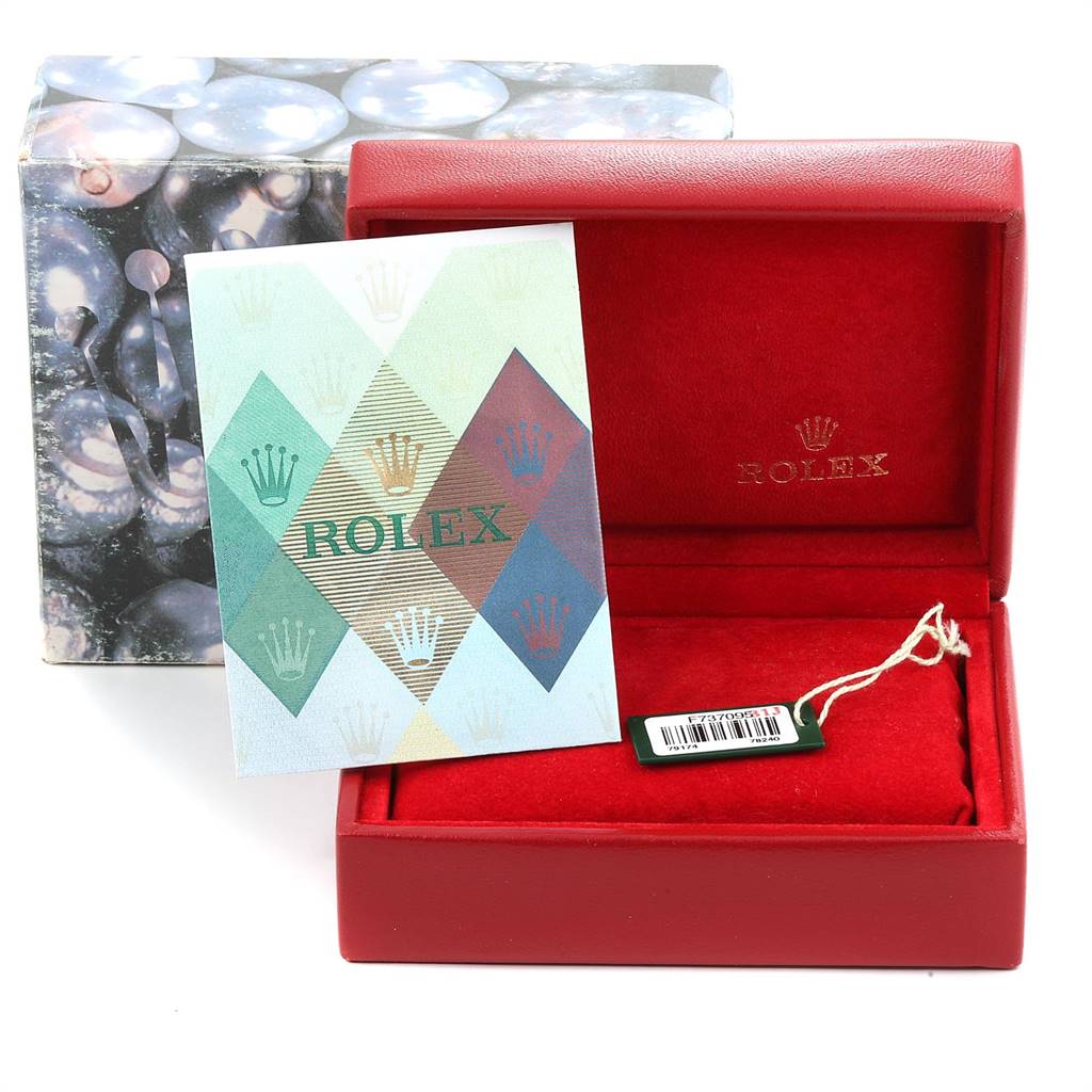 This image shows the box, booklet, and tag for a Rolex Datejust 79174 Women
s Stainless Steel Mother of Pearl Dial 79174 Women
s Stainless Steel Mother of Pearl Dial watch.