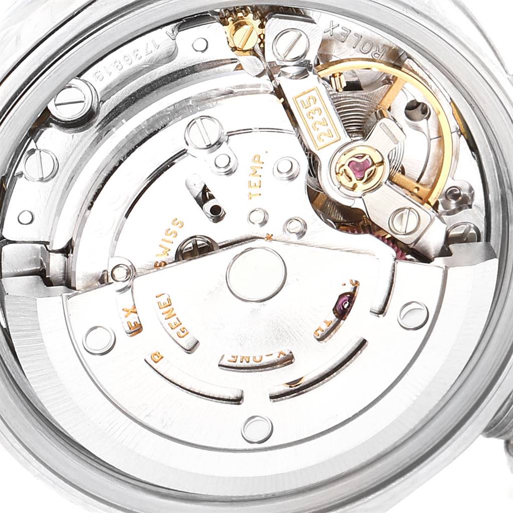 This image shows the internal mechanism of a Rolex Datejust 79174 Women
s Stainless Steel Mother of Pearl Dial 79174 Women
s Stainless Steel Mother of Pearl Dial watch at a close-up angle, highlighting its intricate components.