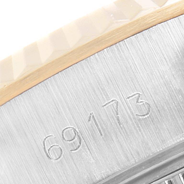 The image shows a close-up of the serial number engraved on the case side of a Rolex Datejust 69173 Women's Stainless Steel Silver Dial 69173 Women's Stainless Steel Silver Dial model.