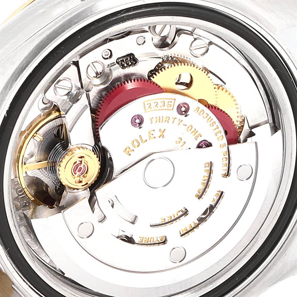 This image shows the internal movement of the Rolex Datejust 279173 Women's Steel and Gold (two tone) Champagne Dial 279173 Women's Steel and Gold (two tone) Champagne Dial watch viewed from the back, highlighting gears and mechanical components.