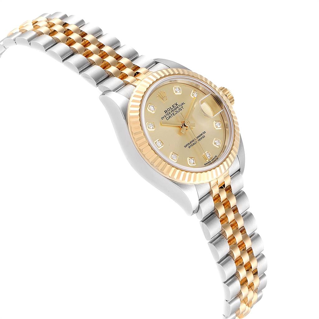 The image shows a Rolex Datejust 279173 Women's Steel and Gold (two tone) Champagne Dial 279173 Women's Steel and Gold (two tone) Champagne Dial watch at an angle highlighting its gold and silver bracelet, fluted bezel, and champagne dial with diamond hour markers.