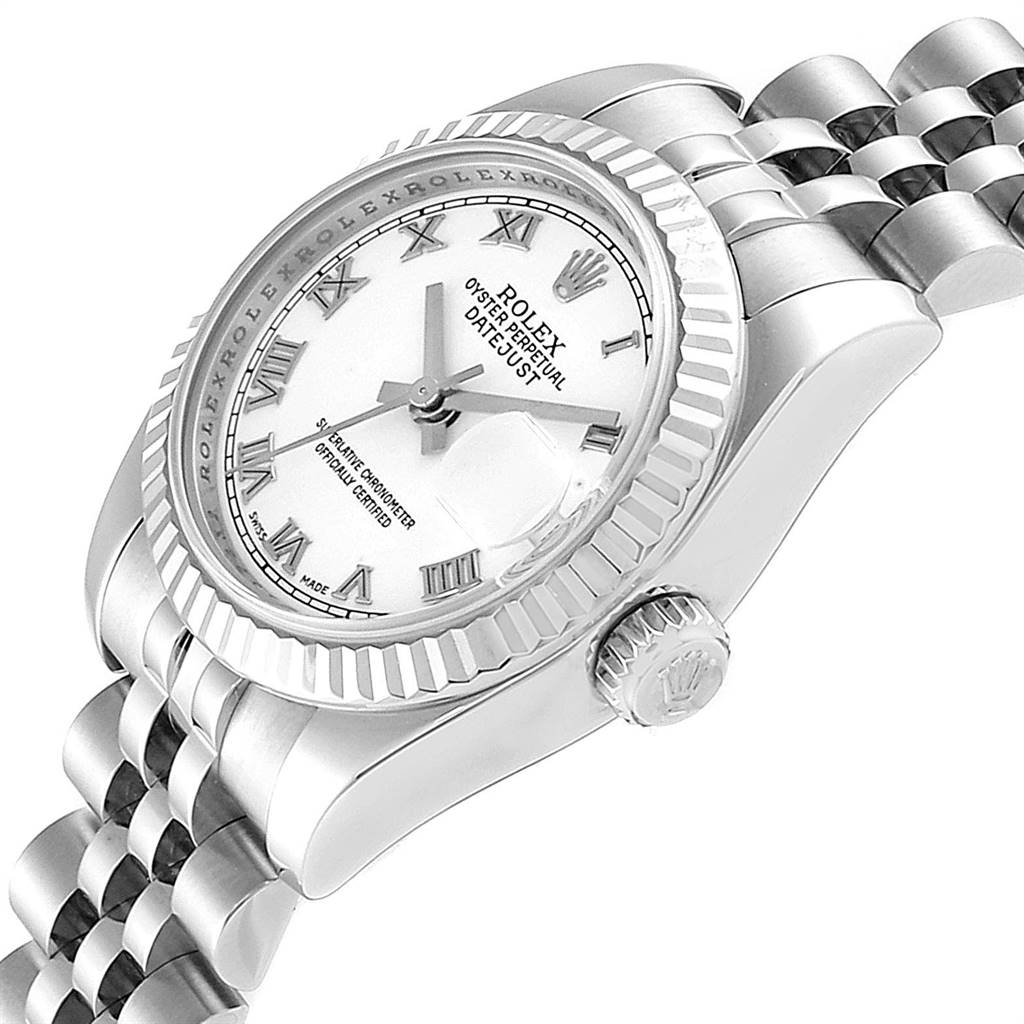 The image shows a Rolex Datejust 179174 Women's Stainless Steel White Dial 179174 Women's Stainless Steel White Dial watch from an angled view highlighting the dial, crown, bezel, and part of the bracelet.
