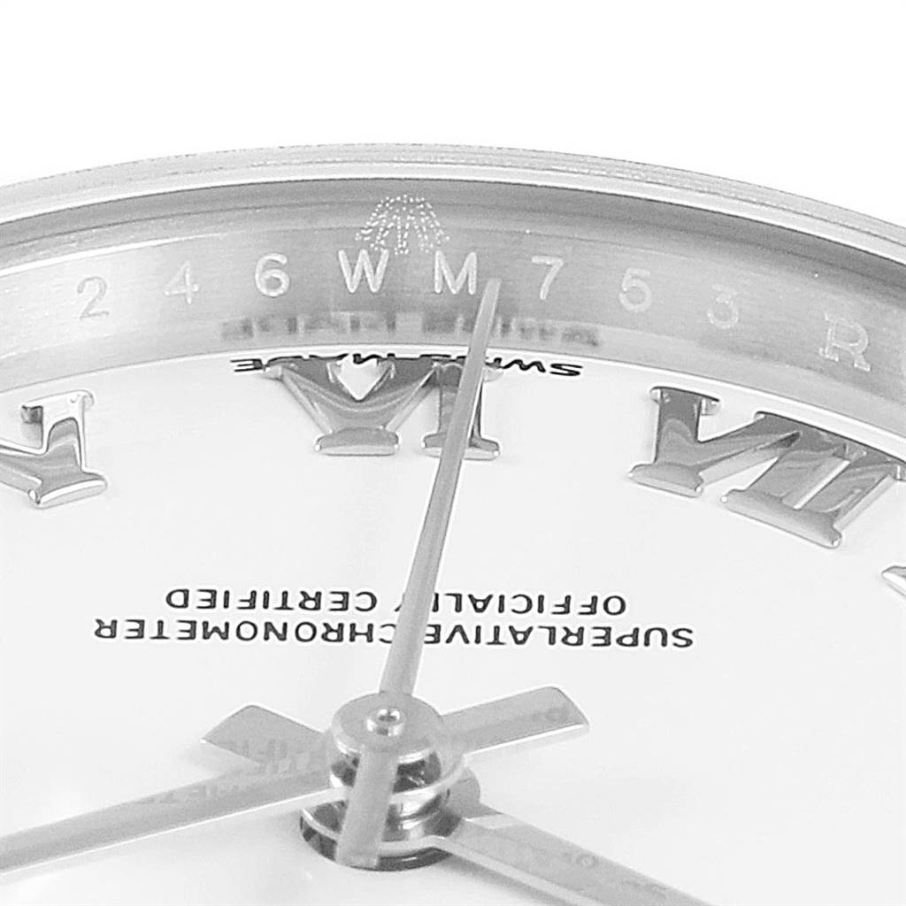 The image shows a close-up angle of the dial and hands of the Rolex Datejust 279174 Women's Stainless Steel White Dial 279174 Women's Stainless Steel White Dial watch, focusing on its inner bezel engraving.