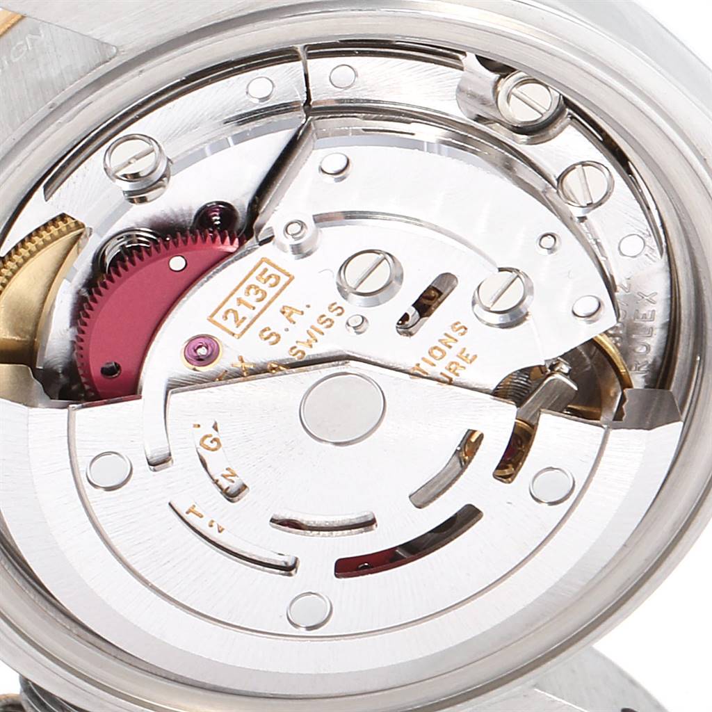 This image shows the intricate inner mechanism of a Rolex Datejust 69163 Women's Stainless Steel Beige Dial 69163 Women's Stainless Steel Beige Dial watch from a top-view angle.