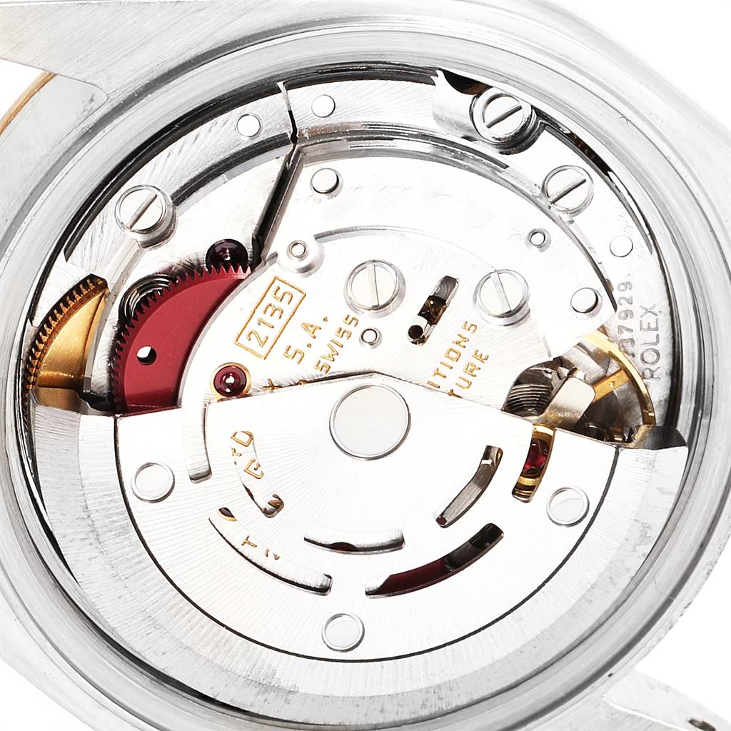 This is a close-up view of the movement mechanism of a Rolex Datejust 69173 Women's Stainless Steel Champagne Dial 69173 Women's Stainless Steel Champagne Dial watch.