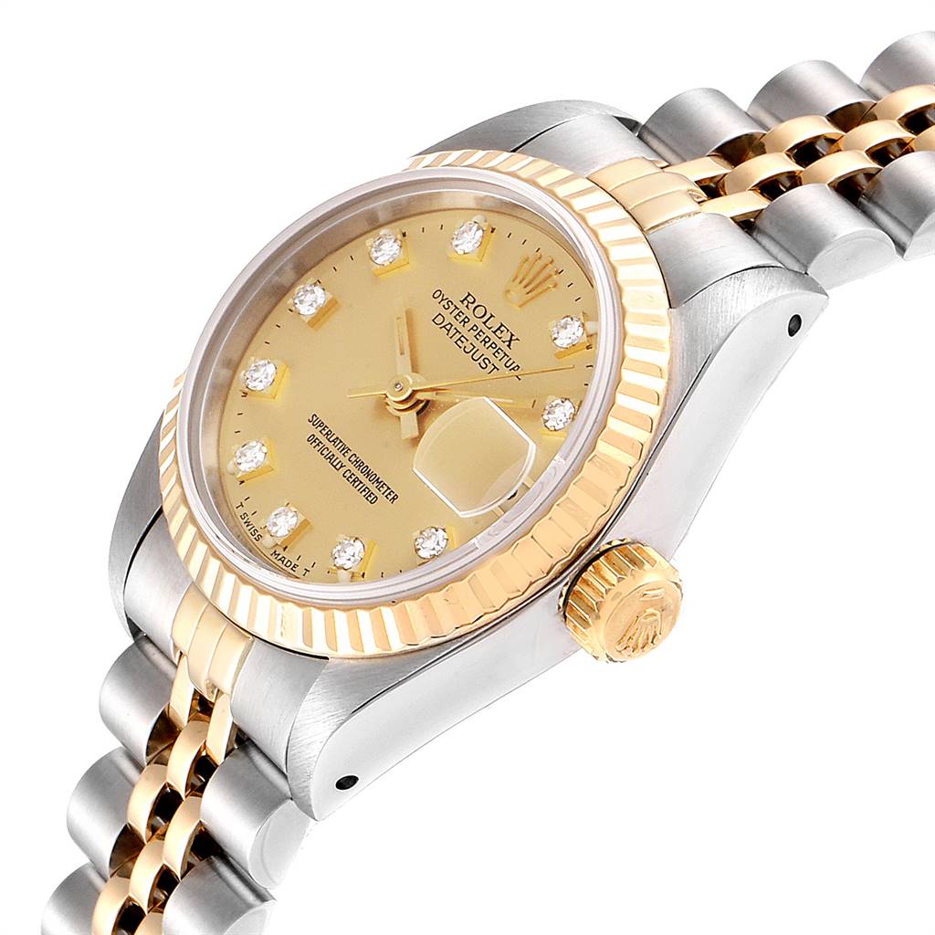 The image shows an angled view of a Rolex Datejust 69173 Women's Stainless Steel Champagne Dial 69173 Women's Stainless Steel Champagne Dial, highlighting the dial, fluted bezel, crown, and two-tone bracelet.