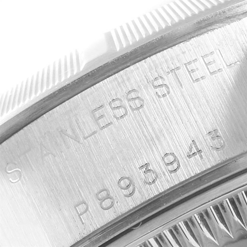 This image shows a close-up of the side casing of the Rolex Datejust 79190 Women's Stainless Steel Black Dial 79190 Women's Stainless Steel Black Dial, highlighting its brushed stainless steel and engravings.