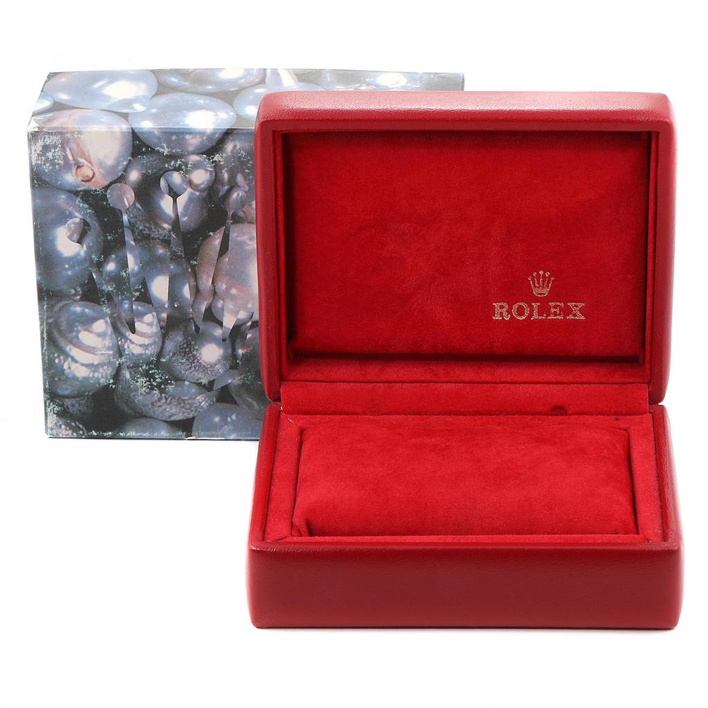 This image shows a red Rolex Datejust 79190 Women's Stainless Steel Black Dial 79190 Women's Stainless Steel Black Dial watch box open, with its inner red suede lining and outer decorative box visible.