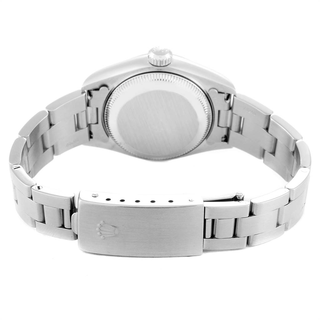 This image shows the backside of a Rolex Datejust 79190 Women's Stainless Steel Black Dial 79190 Women's Stainless Steel Black Dial watch, highlighting the case back and bracelet with the clasp open.