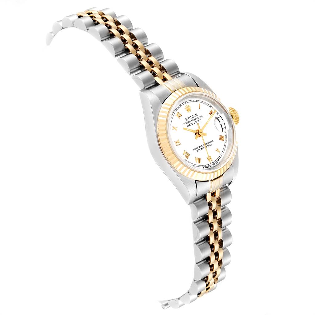 The Rolex Datejust 69173 Women's Stainless Steel White Dial 69173 Women's Stainless Steel White Dial watch is shown from an angled side view, highlighting its gold and silver bracelet and white dial.