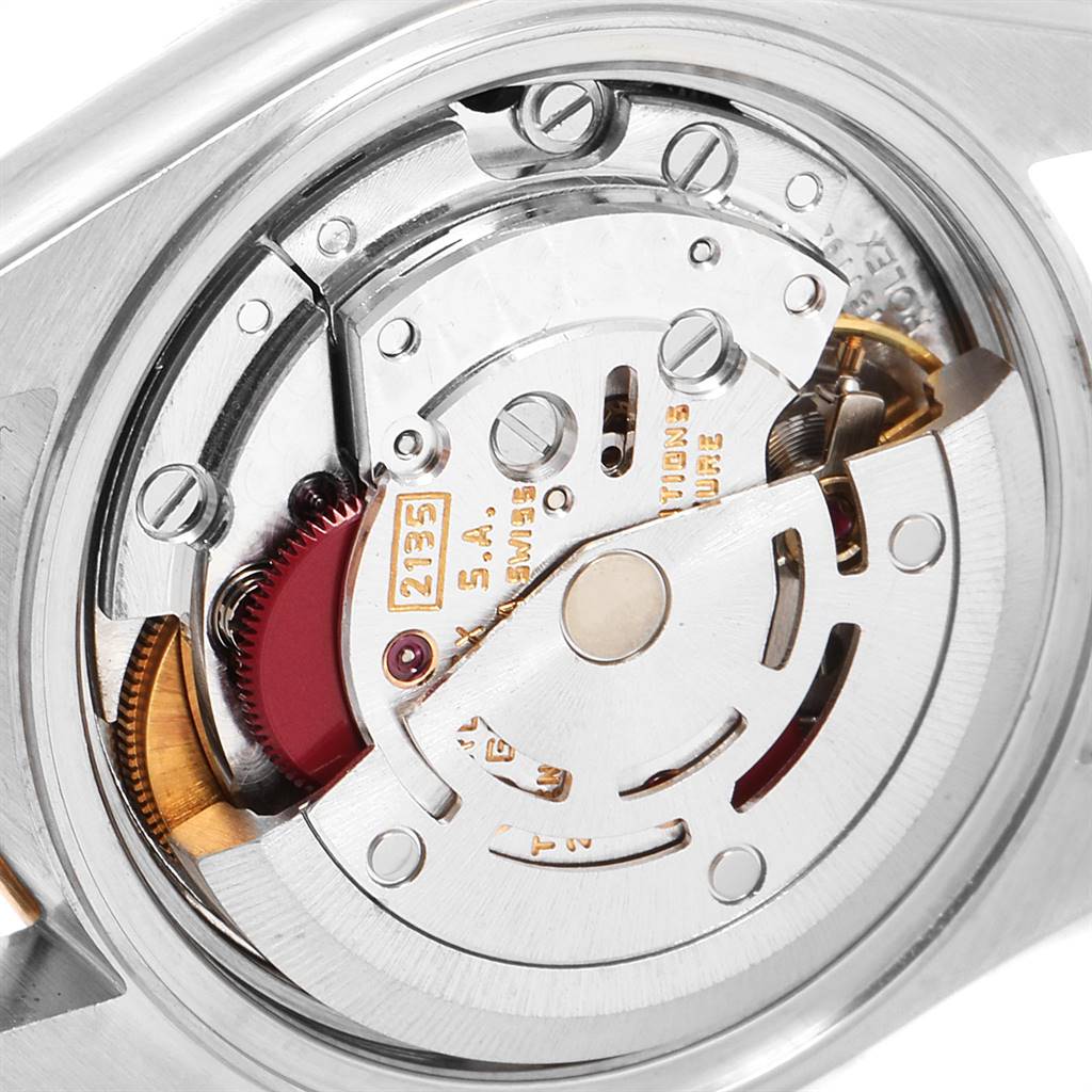 This is a close-up view of the movement mechanism of a Rolex Datejust 79173 Women's Stainless Steel Black Dial 79173 Women's Stainless Steel Black Dial watch.