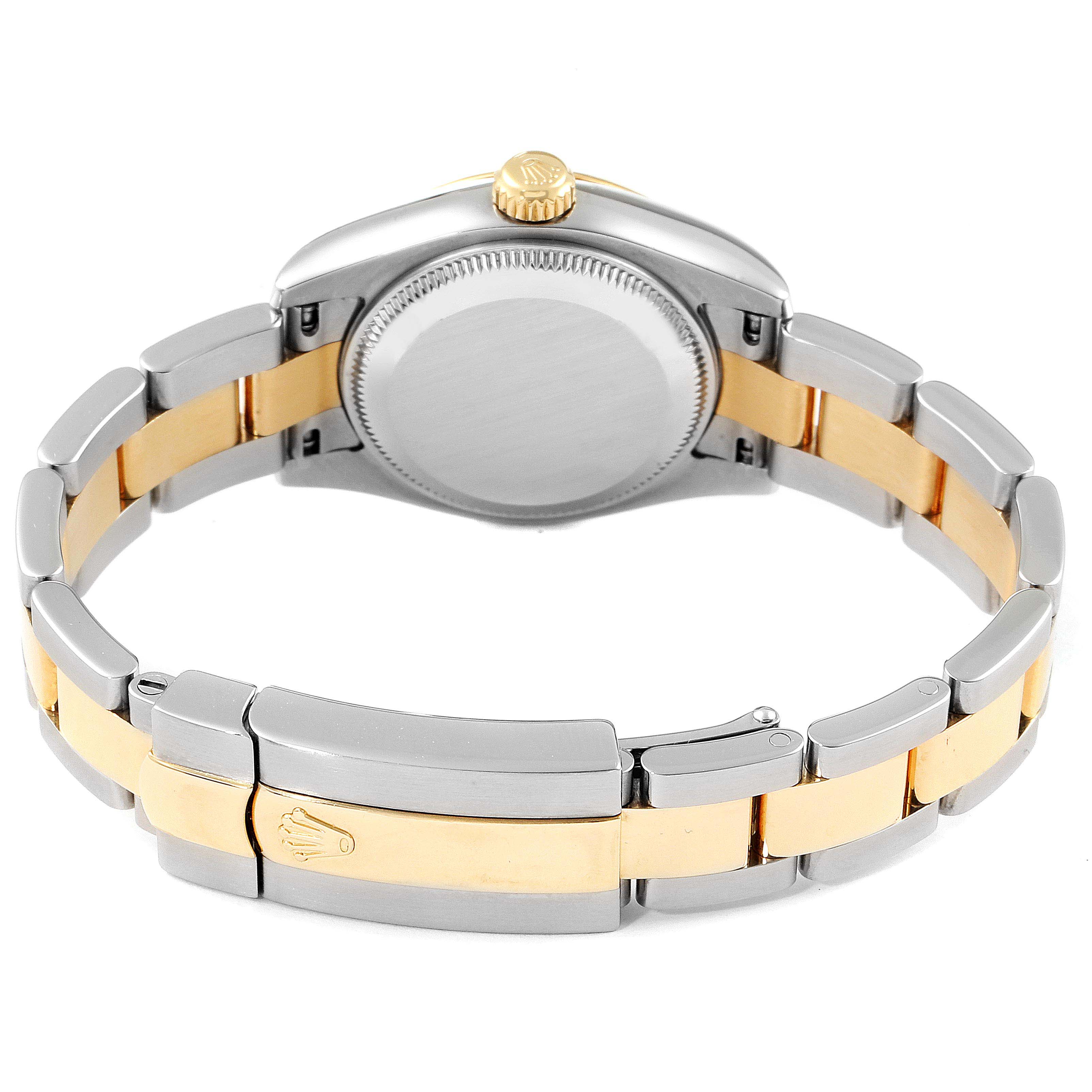 This is a rear angle of the Rolex Datejust 179173 Women's Steel and Gold (two tone) White Dial 179173 Women's Steel and Gold (two tone) White Dial watch showing the case back, crown, and two-tone bracelet.