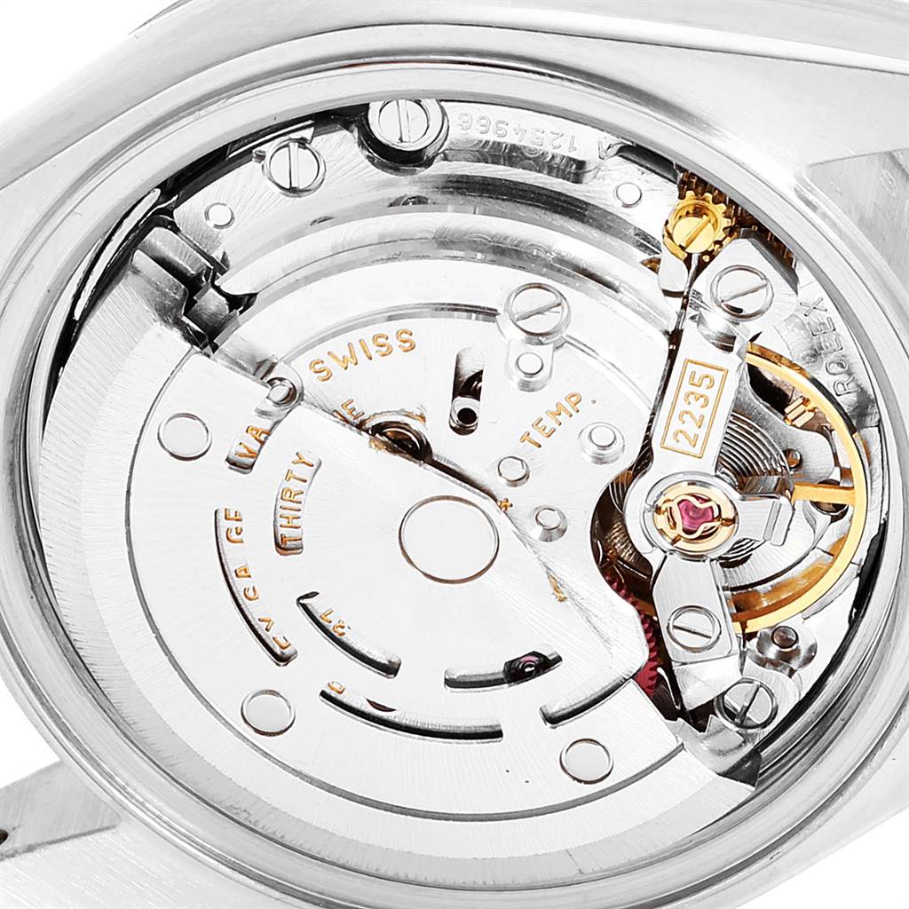 This image shows the intricate movement mechanism of a Rolex Datejust 79174 Women
s Stainless Steel Silver Dial 79174 Women
s Stainless Steel Silver Dial watch from a close-up, back-view angle.