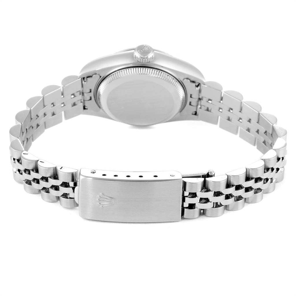 The image shows the back view of the Rolex Datejust 79174 Women
s Stainless Steel Silver Dial 79174 Women
s Stainless Steel Silver Dial watch, focusing on its stainless steel case, crown, and Jubilee bracelet with the clasp.