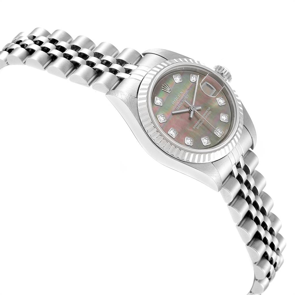The image shows a Rolex Datejust 79174 Women
s Stainless Steel Mother of Pearl Dial 79174 Women
s Stainless Steel Mother of Pearl Dial watch angled to display its dial, bezel, crown, and bracelet with a clear view of the date window.