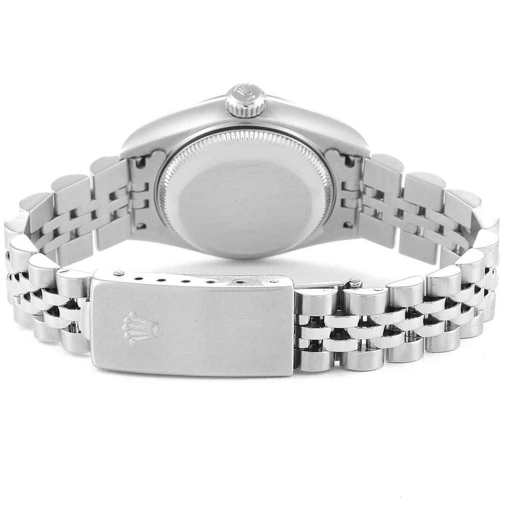 The image shows the back view of the Rolex Datejust 79174 Women
s Stainless Steel Mother of Pearl Dial 79174 Women
s Stainless Steel Mother of Pearl Dial watch, highlighting its case back, jubilee bracelet, and clasp.