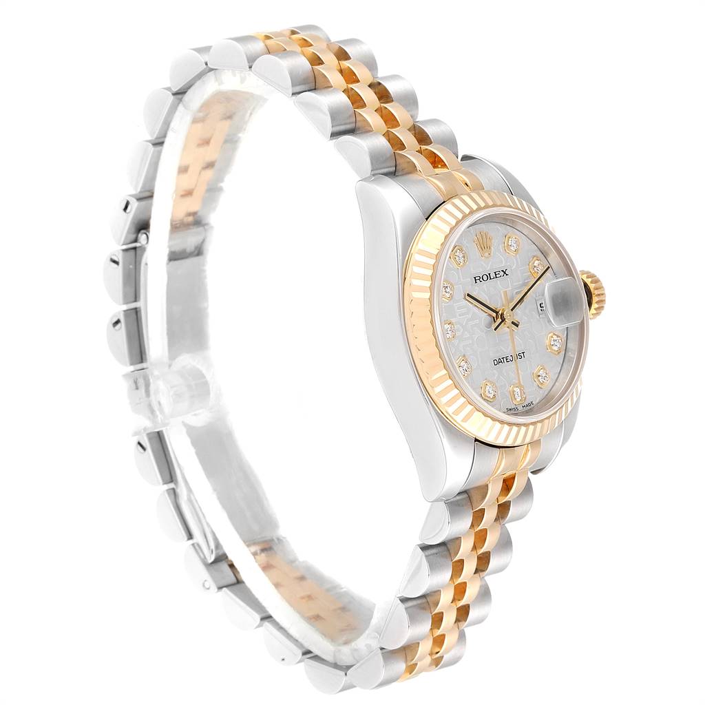 The image shows a Rolex Datejust 179173 Women's Steel and Gold (two tone) Silver Dial 179173 Women's Steel and Gold (two tone) Silver Dial watch at a slight angle, highlighting its metallic band, dial, and fluted bezel.
