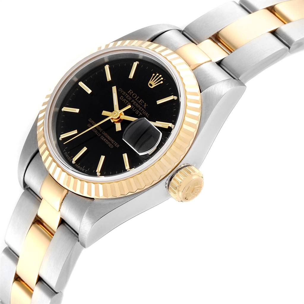 The image shows a Rolex Datejust 69173 Women's Steel and Gold (two tone) Black Dial 69173 Women's Steel and Gold (two tone) Black Dial watch from a slight side angle, highlighting the bezel, crown, and part of the band.