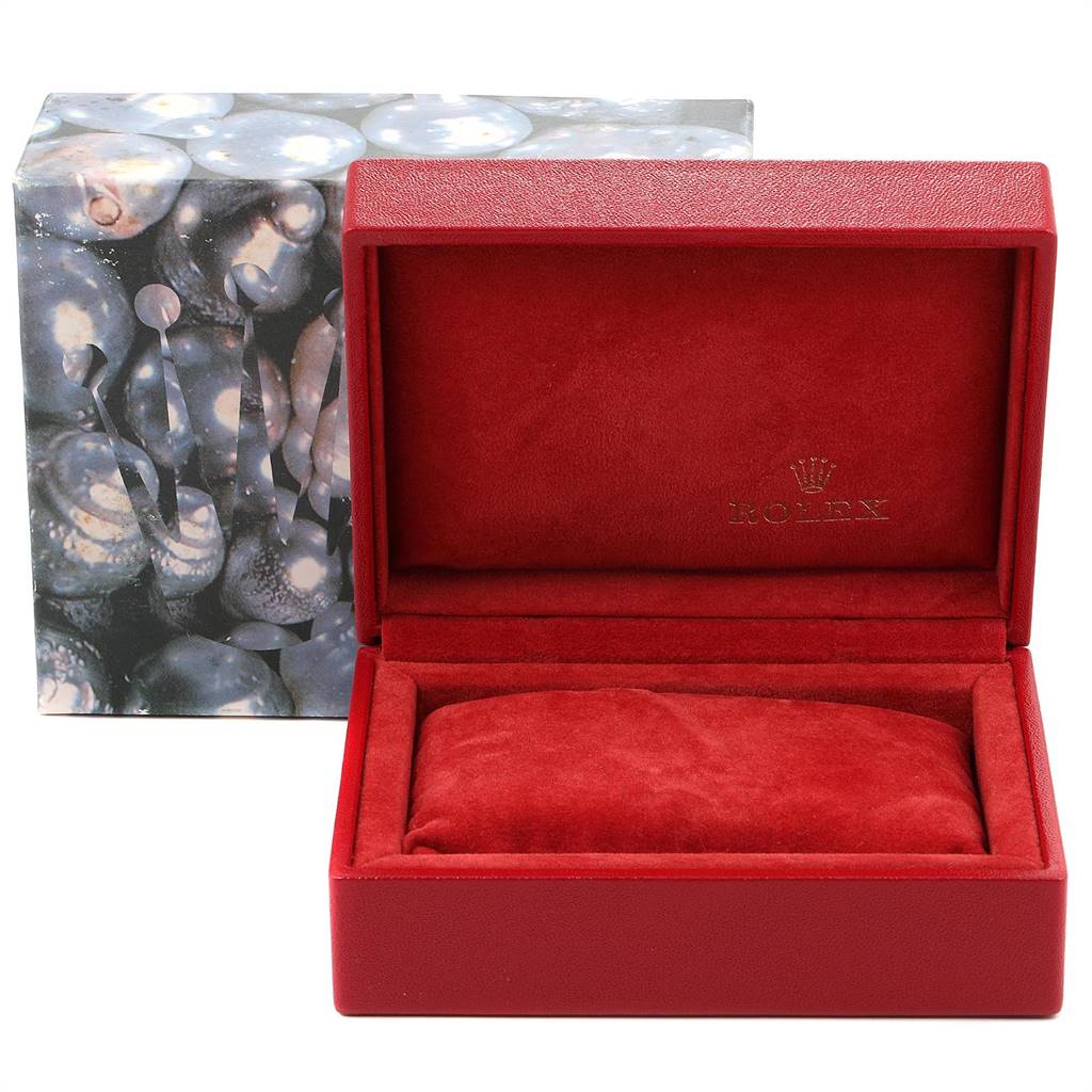 The image shows a Rolex watch box for the Datejust model, featuring a red interior and an outer protective case.